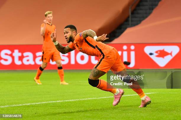 Memphis Depay of Netherlands celebrates after scoring his team's third goal during the UEFA Nations League group stage match between Netherlands and...