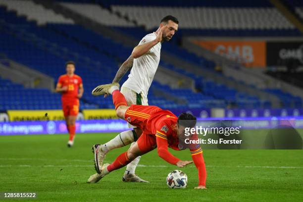 Kieffer Moore of Wales dives after a clash with Shane Duffy of Republic of Ireland and later receives a yellow card during the UEFA Nations League...