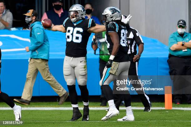Colin Thompson of the Carolina Panthers celebrates after a seven-yard touchdown against the Tampa Bay Buccaneers during their NFL game at Bank of...
