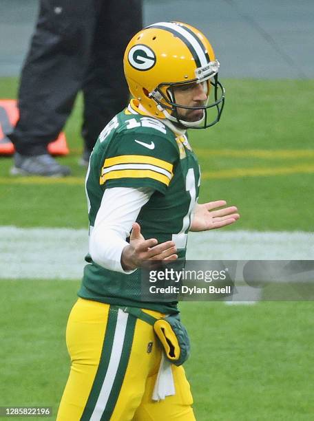 Aaron Rodgers of the Green Bay Packers reacts after throwing a touchdown pass in the 2nd quarter against the Jacksonville Jaguars at Lambeau Field on...