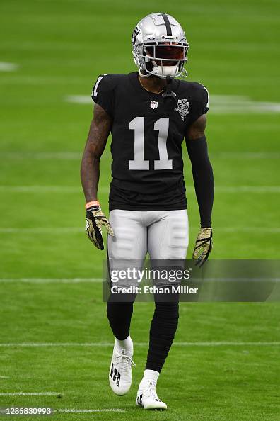 Henry Ruggs Routes Henry Ruggs III of the Las Vegas Raiders walks on the field during ...