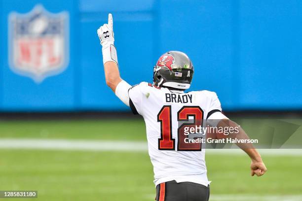 Tom Brady of the Tampa Bay Buccaneers celebrates after a 98-yard touchdown run by Ronald Jones II during their NFL game against the Carolina Panthers...