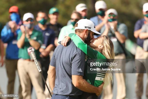 Dustin Johnson of the United States kisses fiancée Paulina Gretzky after winning the Masters at Augusta National Golf Club on November 15, 2020 in...