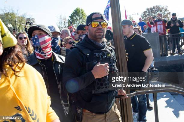 Enrique Tarrio, a leader of the Proud Boys, joins tens of thousands of Trump supporters to rally and march to declare the 2020 Presidential election...