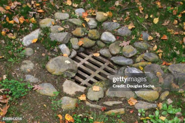 rain water drain in the rural landscape - rainwater basin stock pictures, royalty-free photos & images