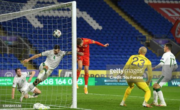 Wales player David Brooks heads in the winning goal despite the attentions of Ireland captain Shane Duffy during the UEFA Nations League group stage...