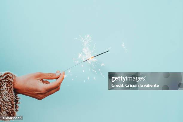 sparkler, celebration. - new years resolutions stock-fotos und bilder