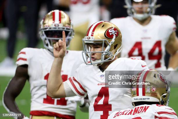 Nick Mullens of the San Francisco 49ers reacts following a play during their game against the New Orleans Saints at Mercedes-Benz Superdome on...