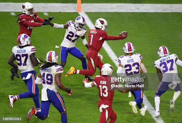Quarterback Kyler Murray of the Arizona Cardinals scores a rushing touchdown during the second half against the Buffalo Bills at State Farm Stadium...