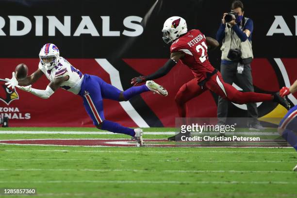 Wide receiver Stefon Diggs of the Buffalo Bills catches a touchdown pass to take the lead as cornerback Patrick Peterson of the Arizona Cardinals...