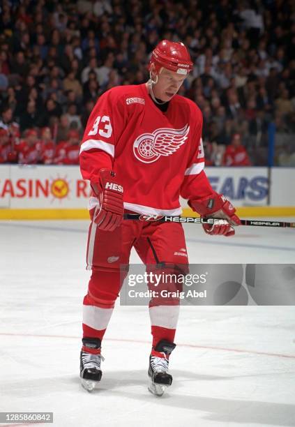 Kris Draper of the Detroit Red Wings skates against the Toronto Maple Leafs during NHL game action on November 13, 1999 at Air Canada Centre in...