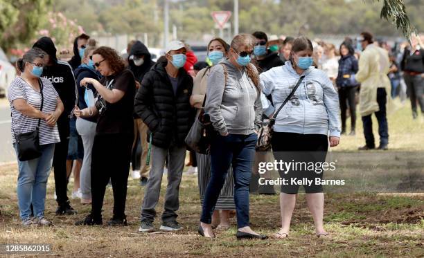 People queuing at the COVID-19 Testing site at Parafield Airport on November 16, 2020 in Adelaide, Australia. South Australia is on alert following...