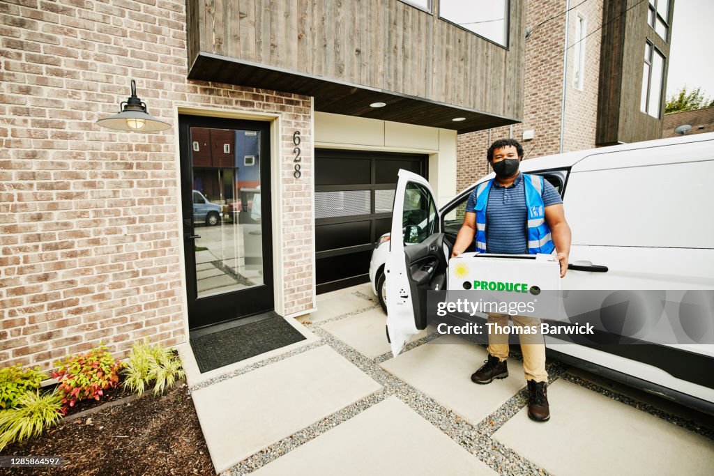 Deliver Rider Mask Portrait Of Male Delivery Driver Wearing Protective Face Mask Holding ...