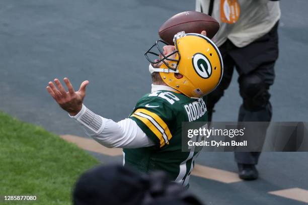 Aaron Rodgers of the Green Bay Packers celebrates after scoring a touchdown in the second quarter against the Jacksonville Jaguars at Lambeau Field...