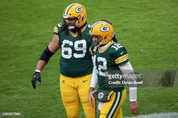 David Bakhtiari and Aaron Rodgers of the Green Bay Packers celebrate after scoring a touchdown in the second quarter against the Jacksonville Jaguars...