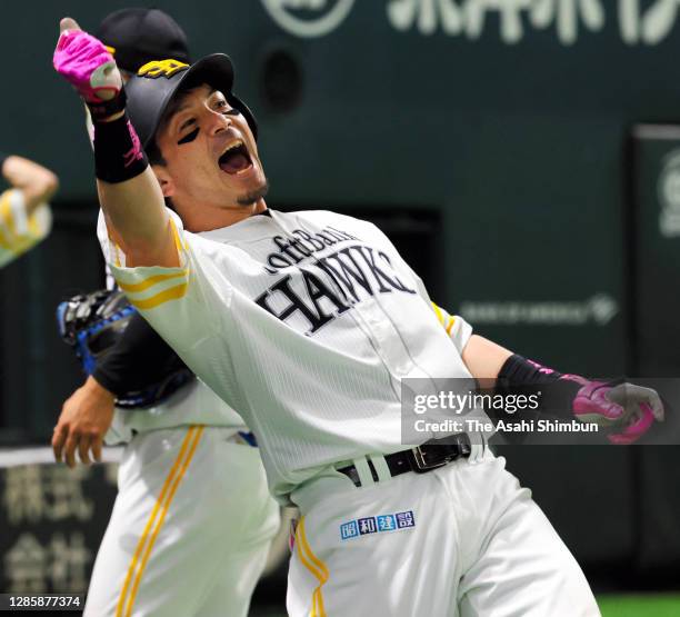 Nobuhiro Matsuda of the Fukuoka SoftBank Hawks celebrates hitting a solo homer to make it 3-5 in the 4th inning during the game two of the Pacific...