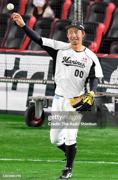 Takashi Toritani of the Chiba Lotte Marines warms up prior to the game two of the Pacific League Climax Series against Fukuoka SoftBank Hawks at the...