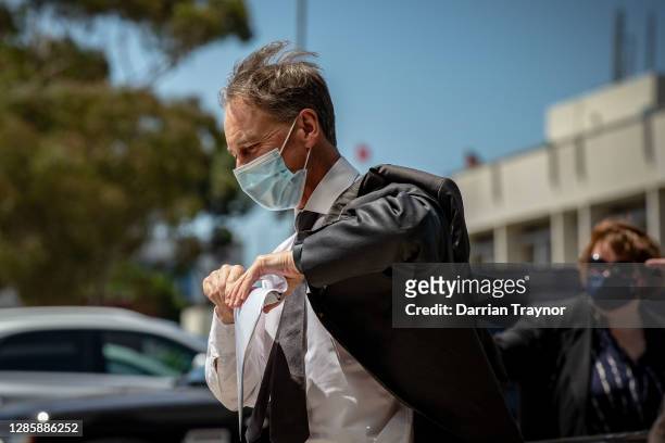 Health Minister Greg Hunt arrives at a press conference on November 16, 2020 in Melbourne, Australia. The federal government has announced a $1.8...