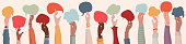Group Raised arms of diversity multi-ethnic multicultural people holding speech bubble in hand. Diverse people talking chatting and sharing information on social networks. Racial equality