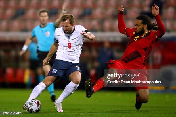 Harry Kane of England shoots on goal in front of Jason Denayer of Belgium during the UEFA Nations League group stage match between Belgium and...