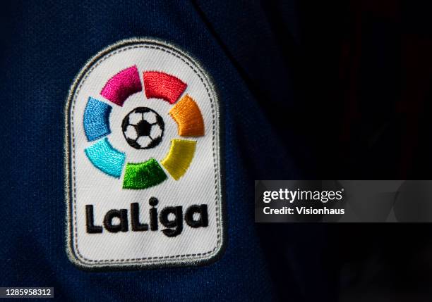 The logo of La Liga on the sleeve of a Barcelona home shirt on 13th November, 2020 in Manchester, United Kingdom.