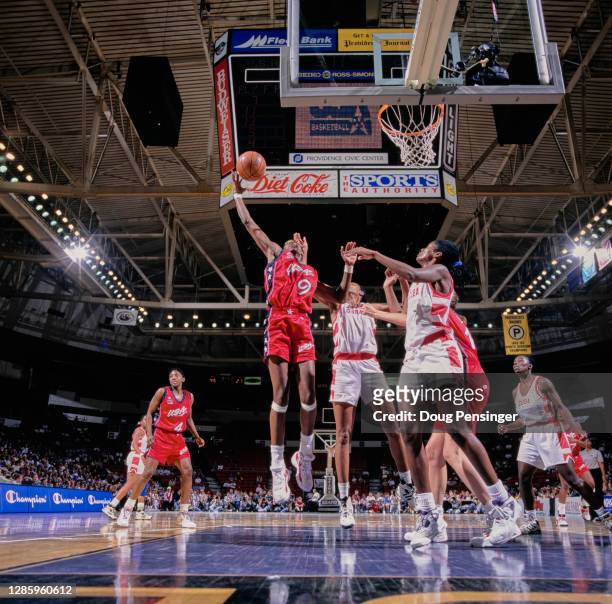 Lisa Leslie, Center for the United States makes a one handed lay up to the basket over the Cuban defense during the Pre Olympic International...