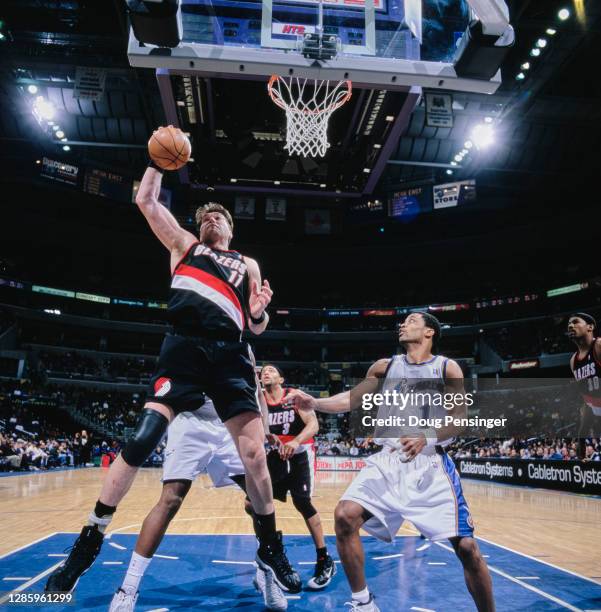 Arvydas Sabonis, Center for the Portland Trail Blazers takes the basketball during the NBA Atlantic Division basketball game against the Washington...