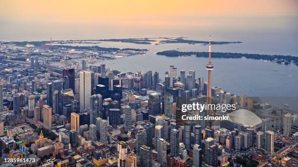 view of cityscape with cn tower - toronto stock pictures, royalty-free photos & images