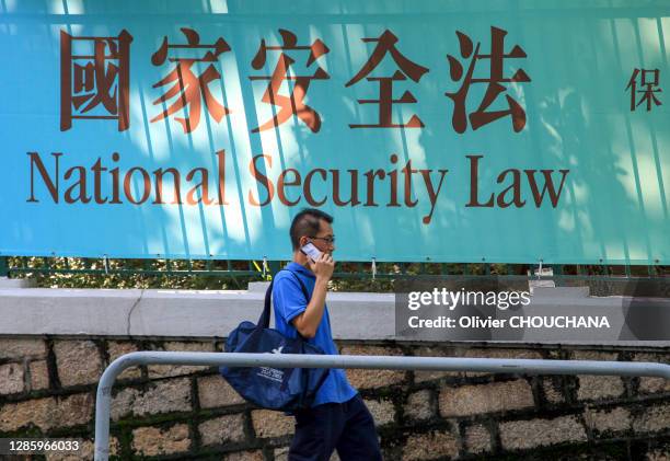 Affiche annonçant la nouvelle loi de "Sécurité Nationale" dans le quartier d'Admiralty le 14 août 2020, Hong Kong, Chine.