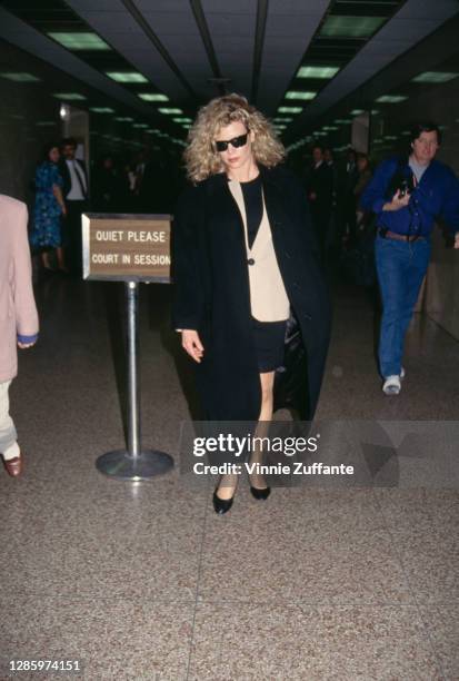 American actress Kim Basinger leaves Los Angeles Superior Court in Los Angeles, California, 1st March 1993. Basinger is being sued by Mainline...