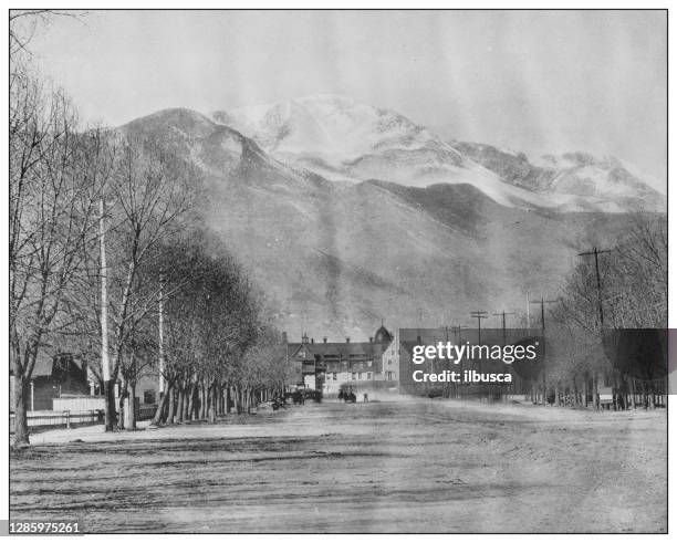 antique black and white photo of the united states: pike's peak from colorado springs - pikes peak snow stock illustrations