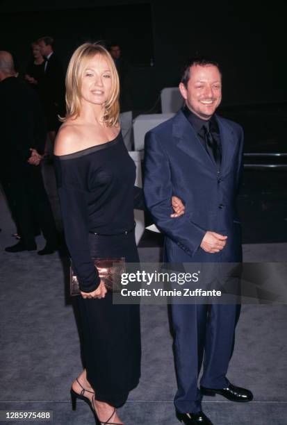American actress Ellen Barkin and American photographer Matthew Rolston attend the AIDS Project Los Angeles Benefit Tom Ford Fashion Show, held in...