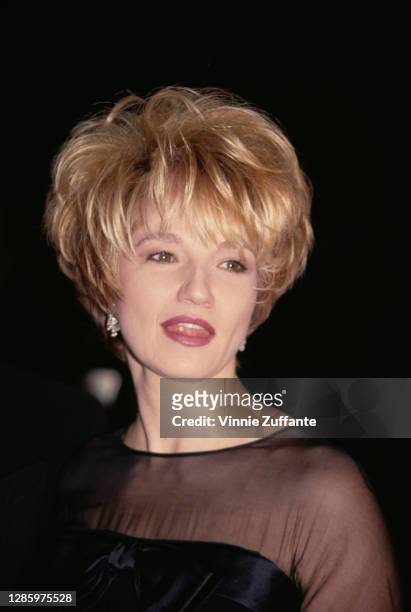 American actress Ellen Barkin attends the 49th Annual Golden Globe Awards, held at the Beverly Hilton Hotel in Beverly Hills, California, 18th...