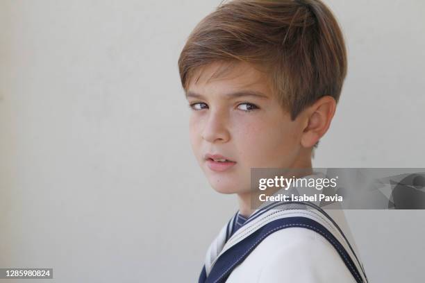 portrait of boy in his first holy communion suit - prima comunione foto e immagini stock