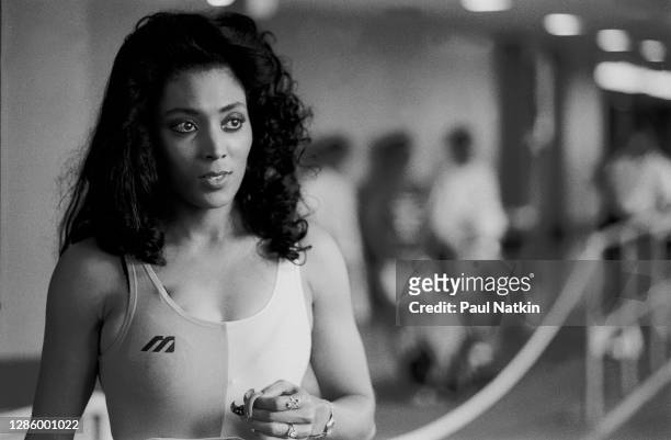 American track star Florence Griffith Joyner works out at the East Bank Club during a taping of the Oprah Winfrey Show on September 4, 1987 in...
