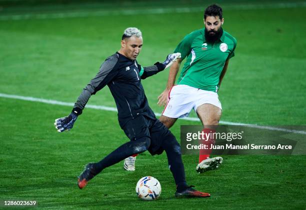 Asier Villalibre of Euskadi competes for the ball with Keylor Navas of Costa Rica during the International Friendly match between Euskadi and Costa...