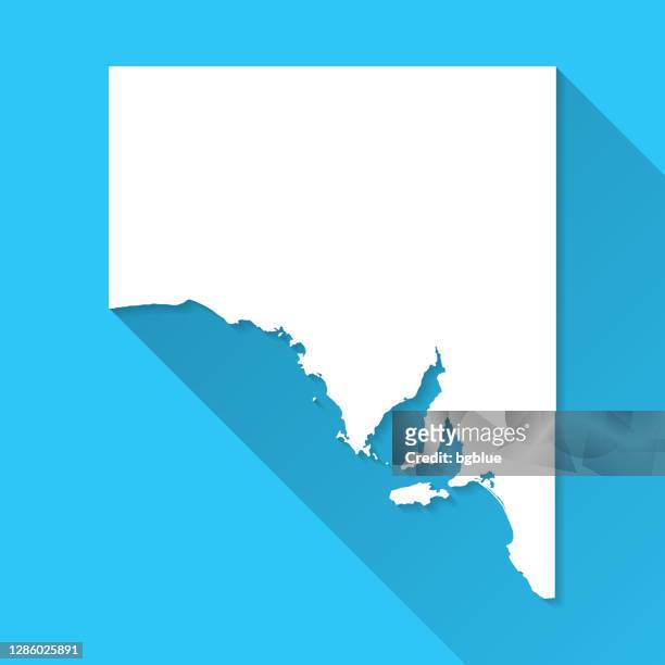 südaustralien karte mit langem schatten auf blauem hintergrund - flat design - south australia stock-grafiken, -clipart, -cartoons und -symbole