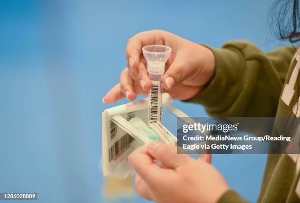 Spring Township, PA A student opens their test kit. At the Penn State Berks Beaver Community Center gymnasium in Spring Township Monday morning...