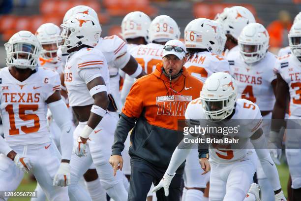 Head coach Tom Herman of the Texas Longhorns directs his team before a game against the Oklahoma State Cowboys at Boone Pickens Stadium on October...