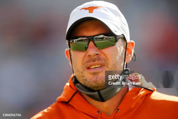 Head coach Tom Herman of the Texas Longhorns greets his team before a game against the Oklahoma State Cowboys at Boone Pickens Stadium on October 31,...