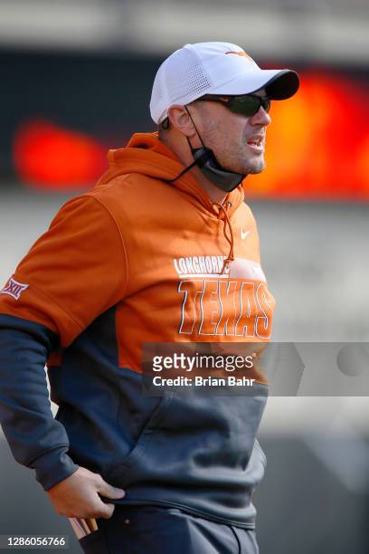 Head coach Tom Herman of the Texas Longhorns leads his team before a game against the Oklahoma State Cowboys at Boone Pickens Stadium on October 31,...
