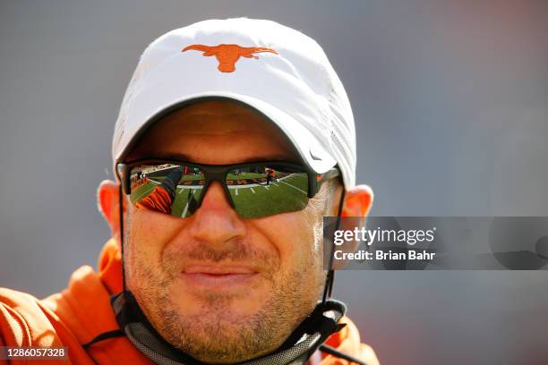 Head coach Tom Herman of the Texas Longhorns greets his team before a game against the Oklahoma State Cowboys at Boone Pickens Stadium on October 31,...