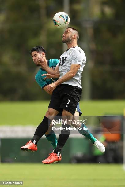 Connor O'Toole of the Olyroos and Ivan Franjic of Macarthur FC compete for the ball the friendly match between the Australia U-23 Olyroos and...