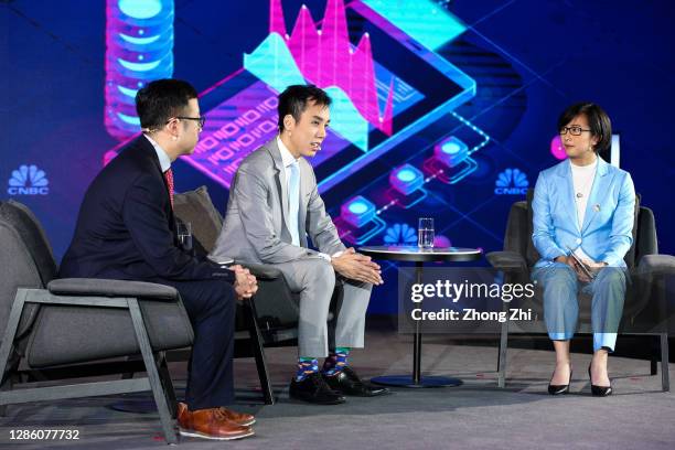 Partner of Antler Hongye Wang, Head of Research, China for UBS Securities Co. Limited Eric Lin and Evelyn Cheng of CNBC speak during Day 1 of CNBC...