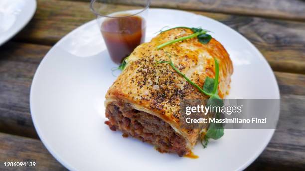 dish with meat pie - meat pie stock pictures, royalty-free photos & images