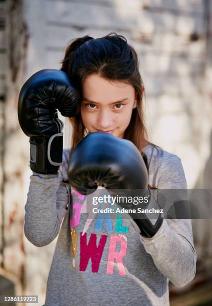 i pack a pretty mean punch - boxing girls stock pictures, royalty-free photos & images