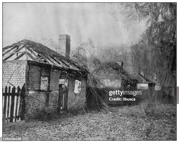 antique black and white photo of the united states: ghosts of the past, deserted slave quarters - slave quarters stock illustrations