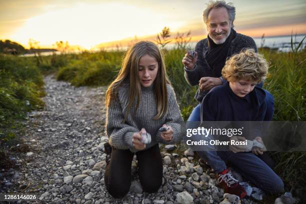 Kid Collecting Rocks 571 Kids Collecting Rocks Stock Photos, High-Res Pictures, and Images ...