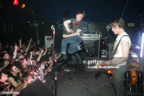 Indie guitar band The Cribs performing in Leeds with Ricky Wilson from The Kaiser Chiefs in 2005