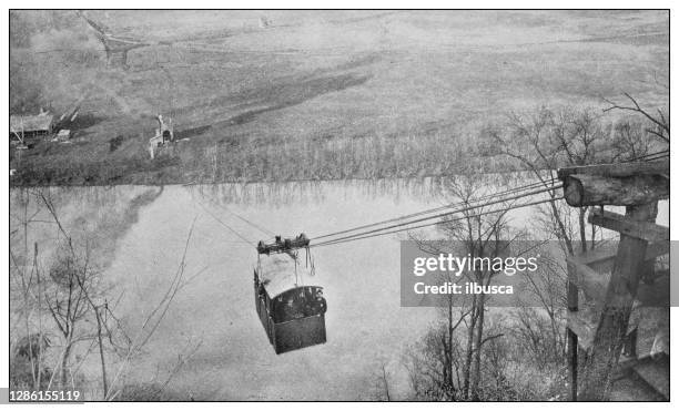 ilustraciones, imágenes clip art, dibujos animados e iconos de stock de foto antigua en blanco y negro de los estados unidos: teleférico aéreo a través del río tennessee en knoxville - knoxville tennessee